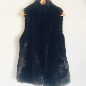 Long black faux fur vest
